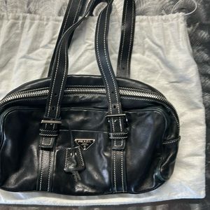 Blake Prada shoulder purse with small front and back pockets and lock with keys